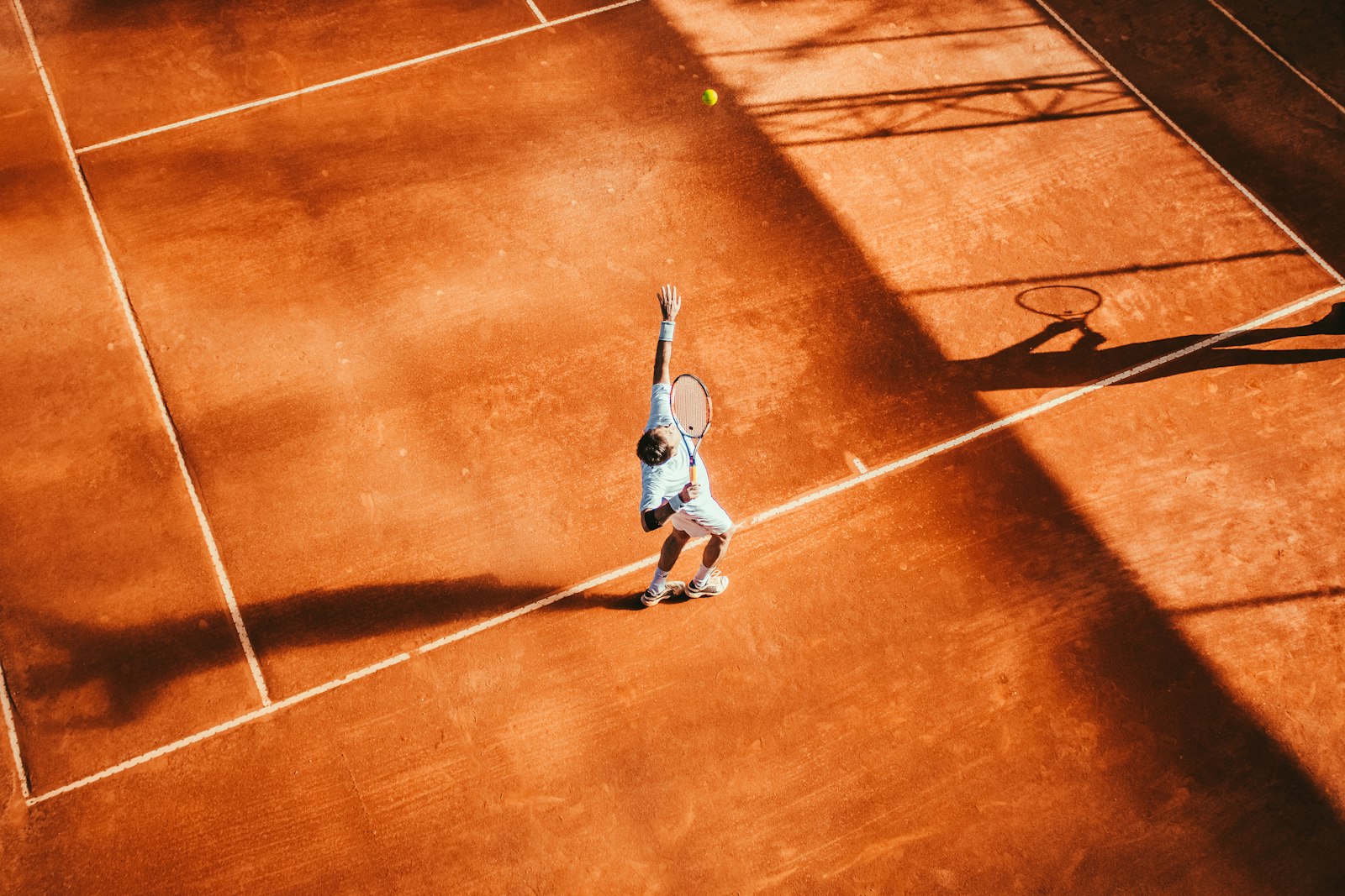 Seniors playing pickleball outdoors in Florida — a popular snowbird activity in Port St Lucie